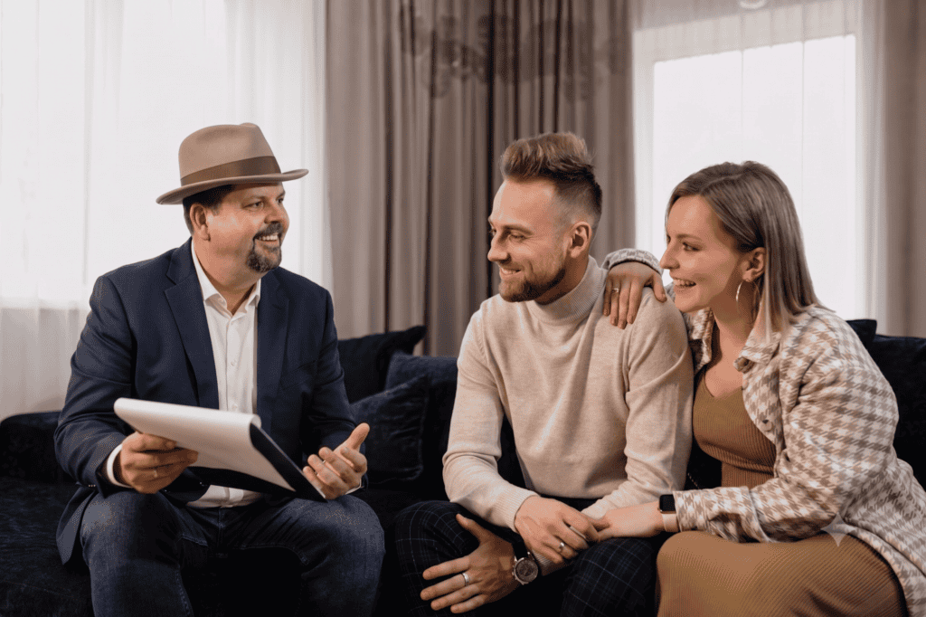 Image of Jeff on couch talking to some clients